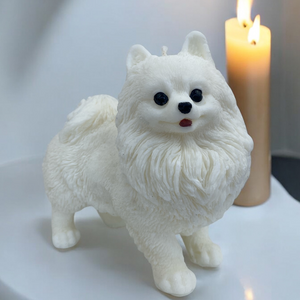 Coco Pomeranian Dog Candle white in colour looks like a Pomeranian.